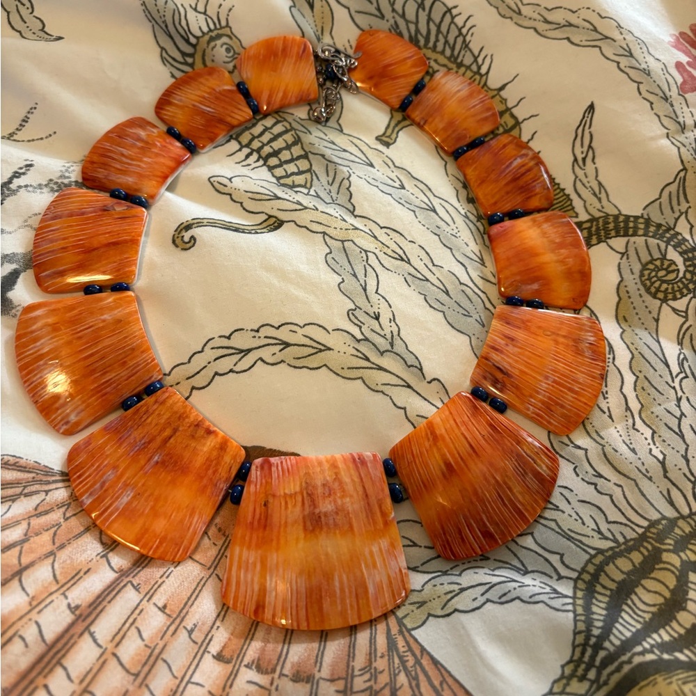 Orange Necklace with Natural Stone Segments and Circular Design